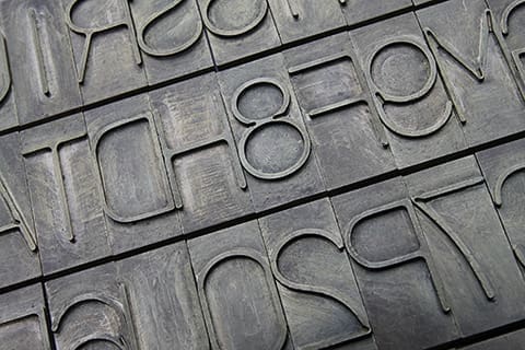 A close-up photo of the numbers and alphabets type sorts.