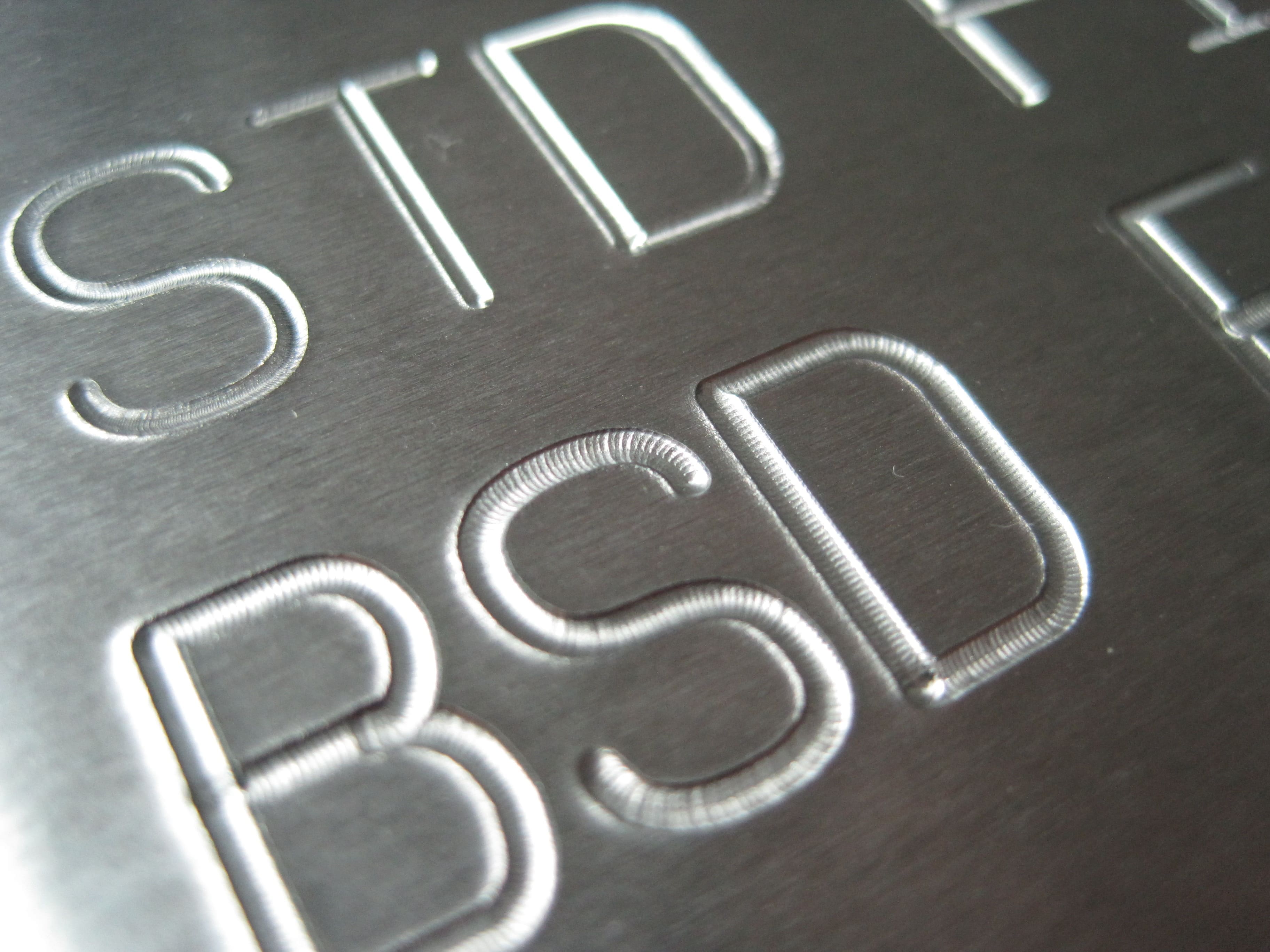 Image of 'STD BSD' engraved on steel