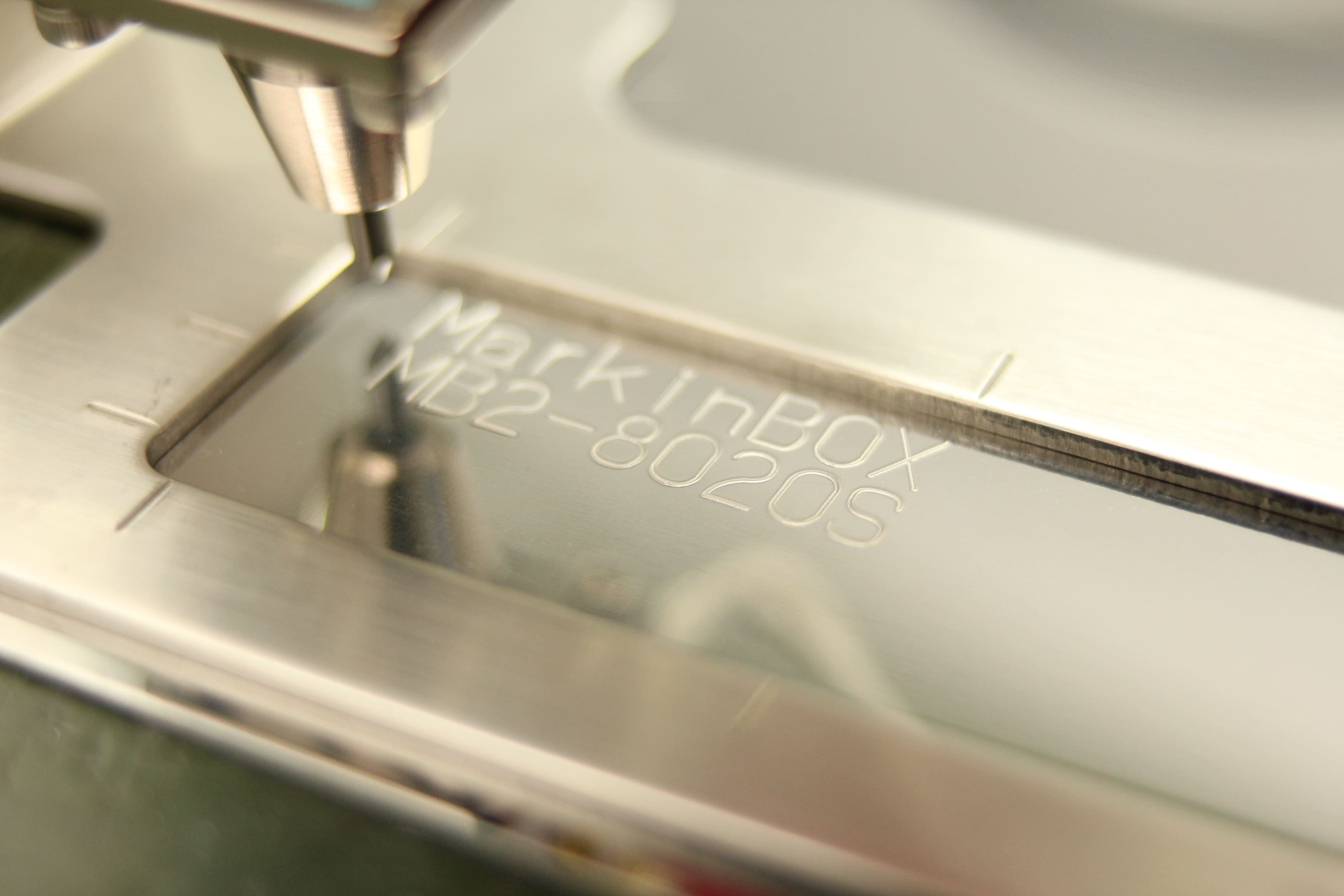 Image of 'MarkinBOX' and serial numbers 'MB2-8020S' engraved on stainless steel