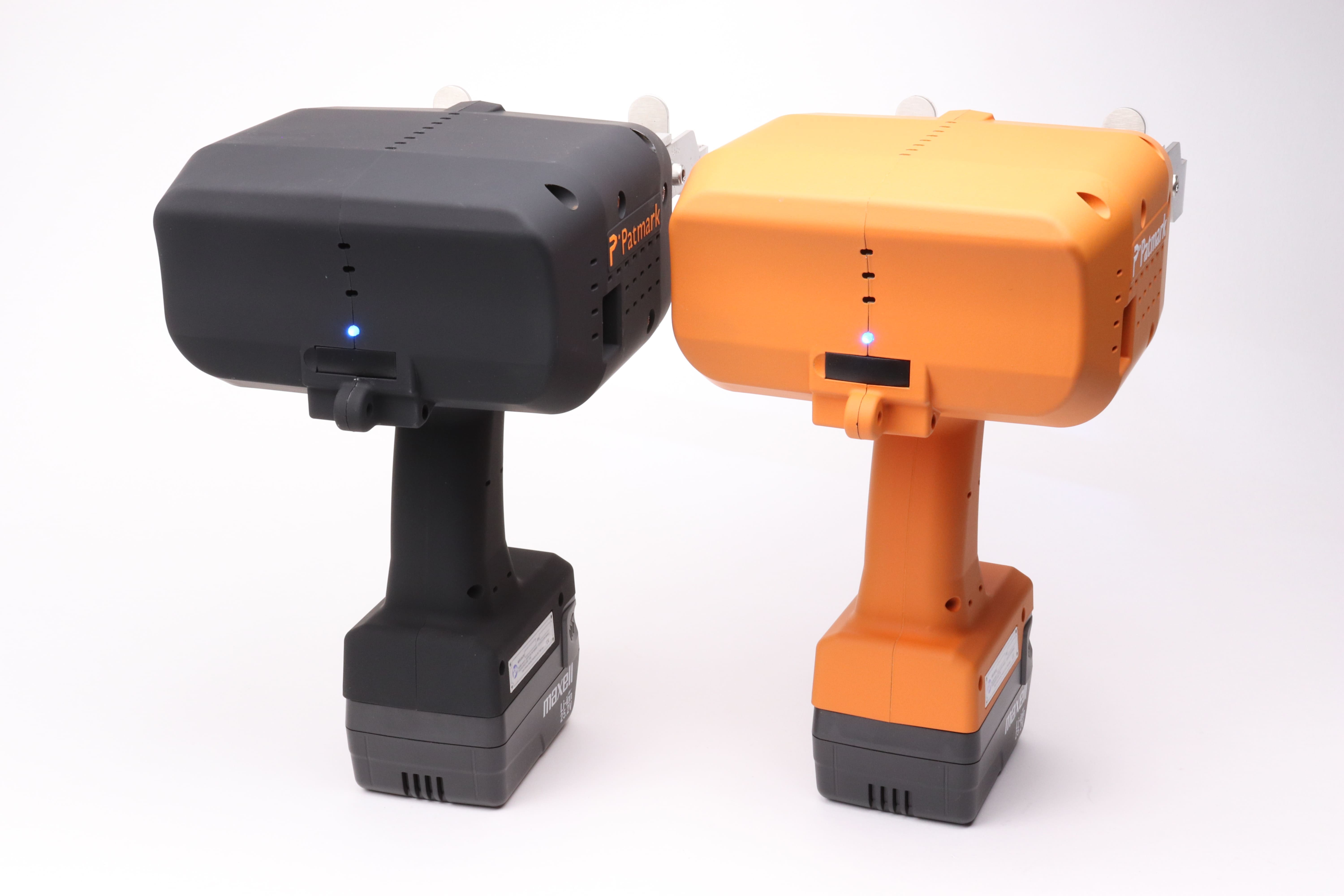 Image of the rear view of the Patmark-plus units of the Patmark series, one in orange and one in black.